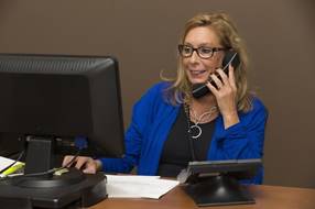 A sales woman on the phone